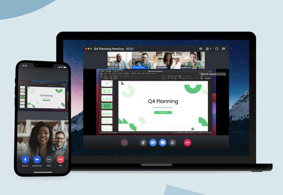 GoTo Meeting running on a laptop and a phone
